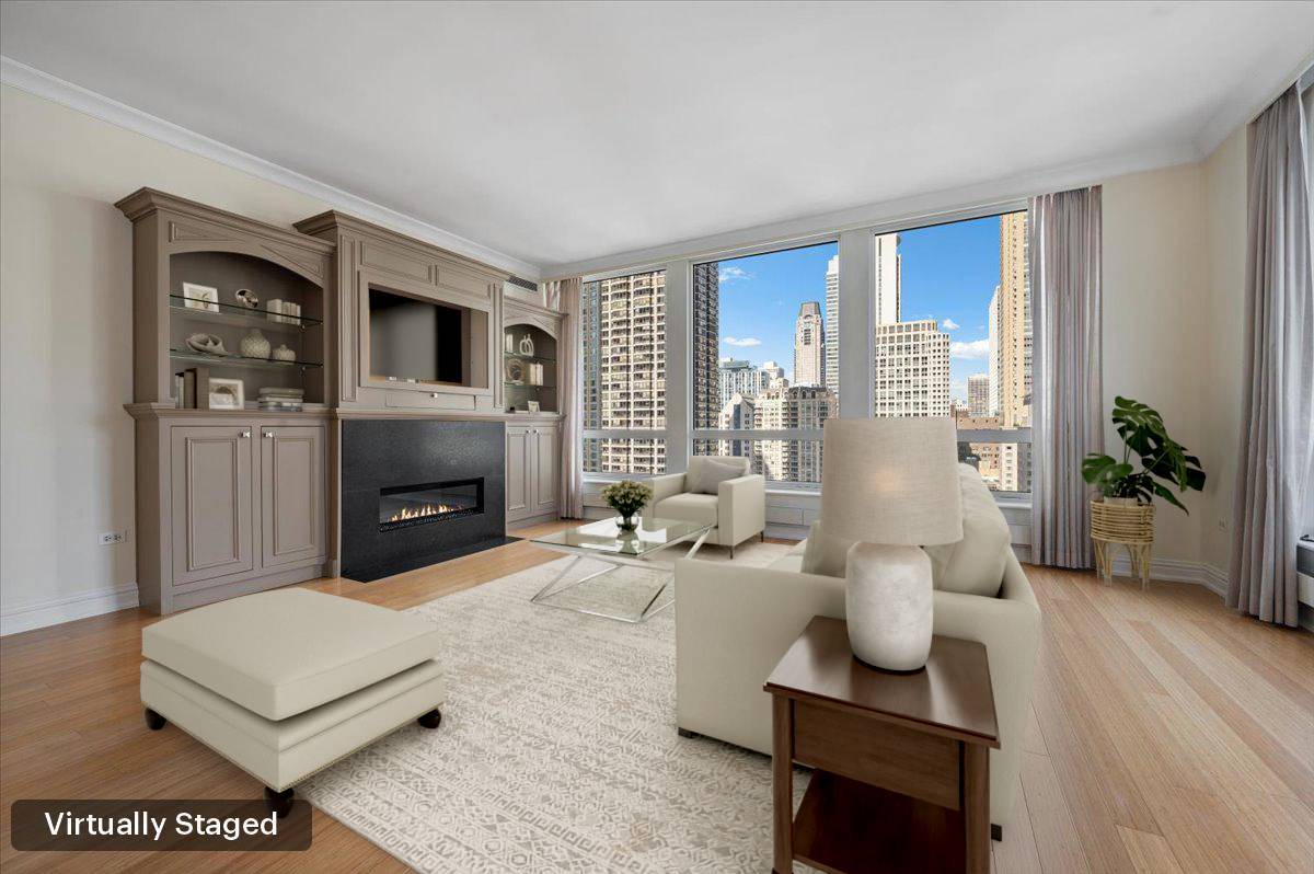 55 East Erie Street, Unit 1903 Chicago, IL 60611 - Photo 10 of 39 a living room with furniture