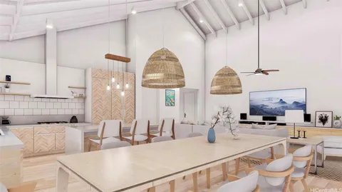 a dining room with a table and chairs