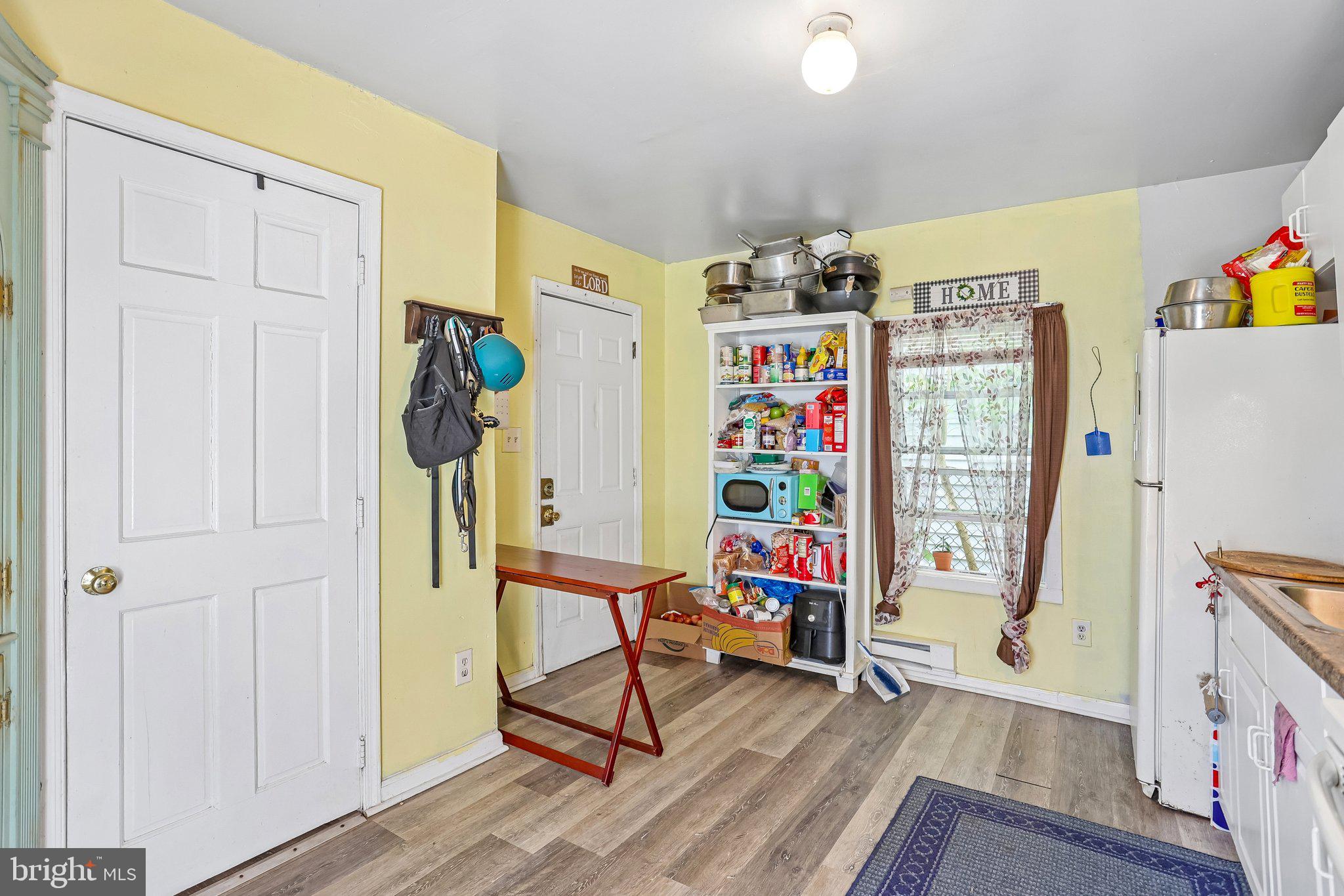 64 Union Street Salem, NJ 08079 - Photo 8 of 32 a view of an entryway with wooden floor