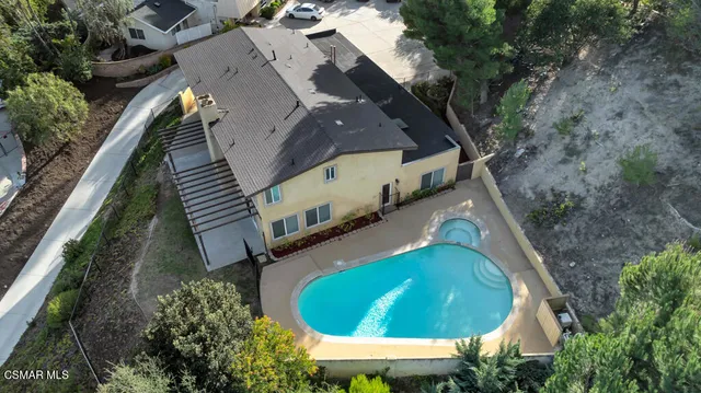 a view of balcony with furniture