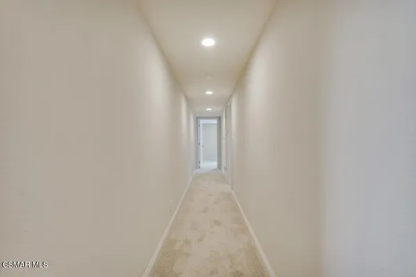 a view of a glass door and porch