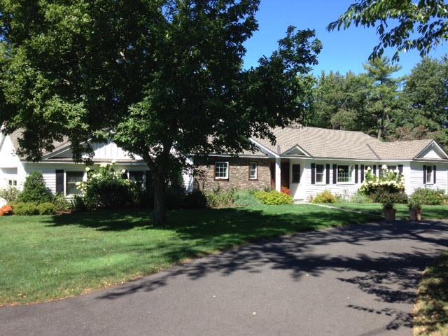 48 West Hill Road Stamford, CT 06902 - Photo 1 of 1 a front view of a house with garden