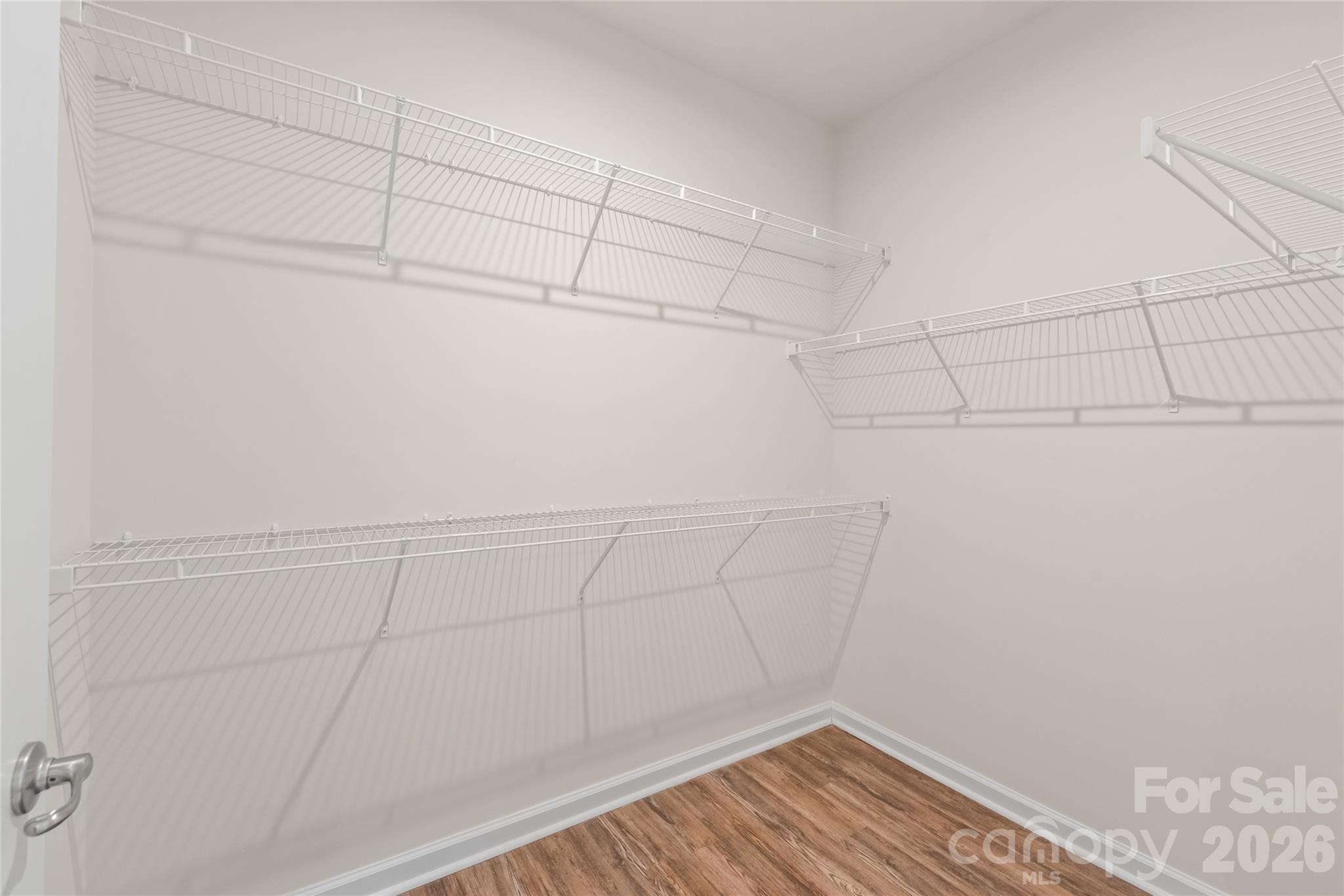 1960 Slippery Rock Lane Monroe, NC 28112 - Photo 17 of 32 a view of a room with racks on the wall