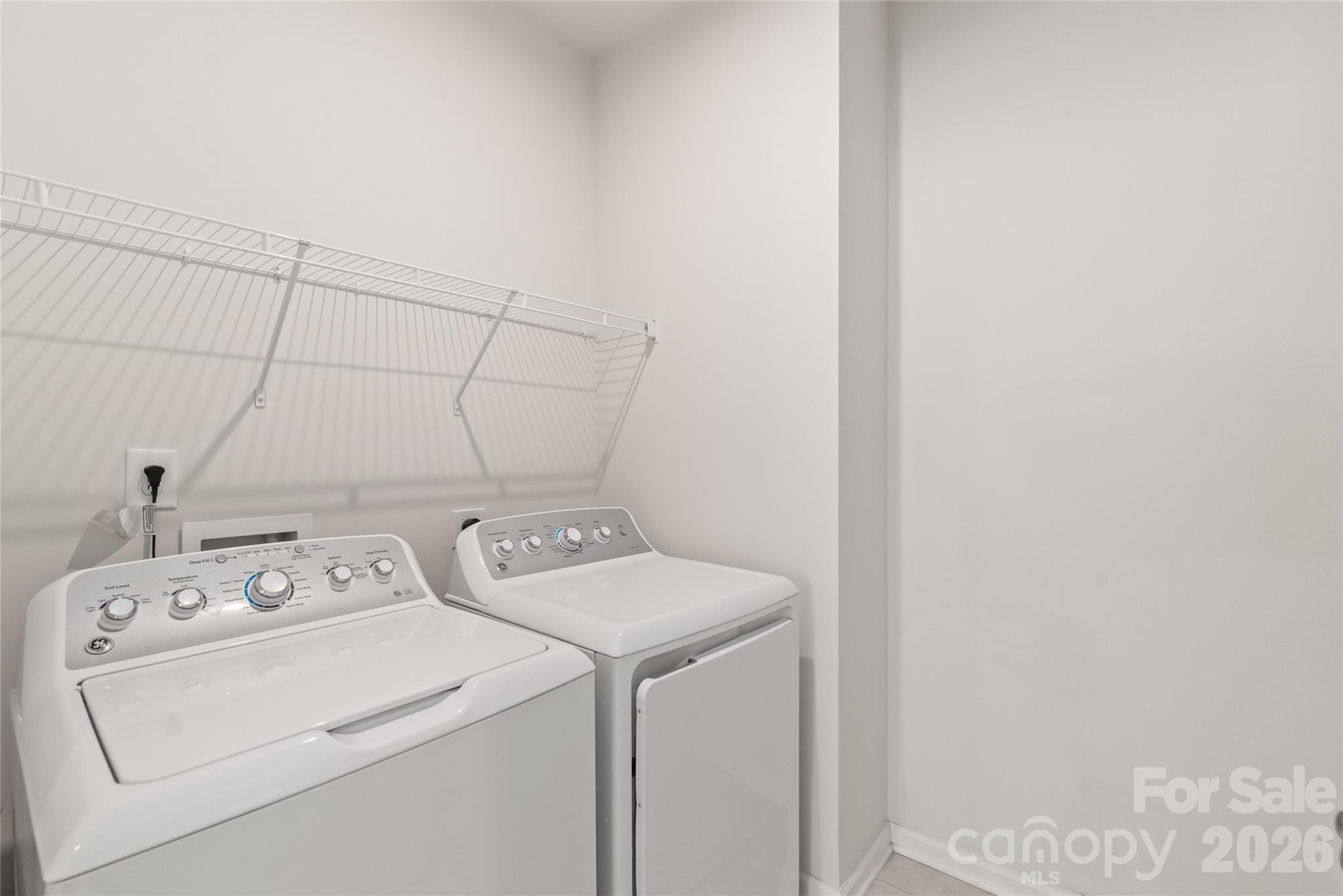 1960 Slippery Rock Lane Monroe, NC 28112 - Photo 18 of 32 a utility room with dryer and washer