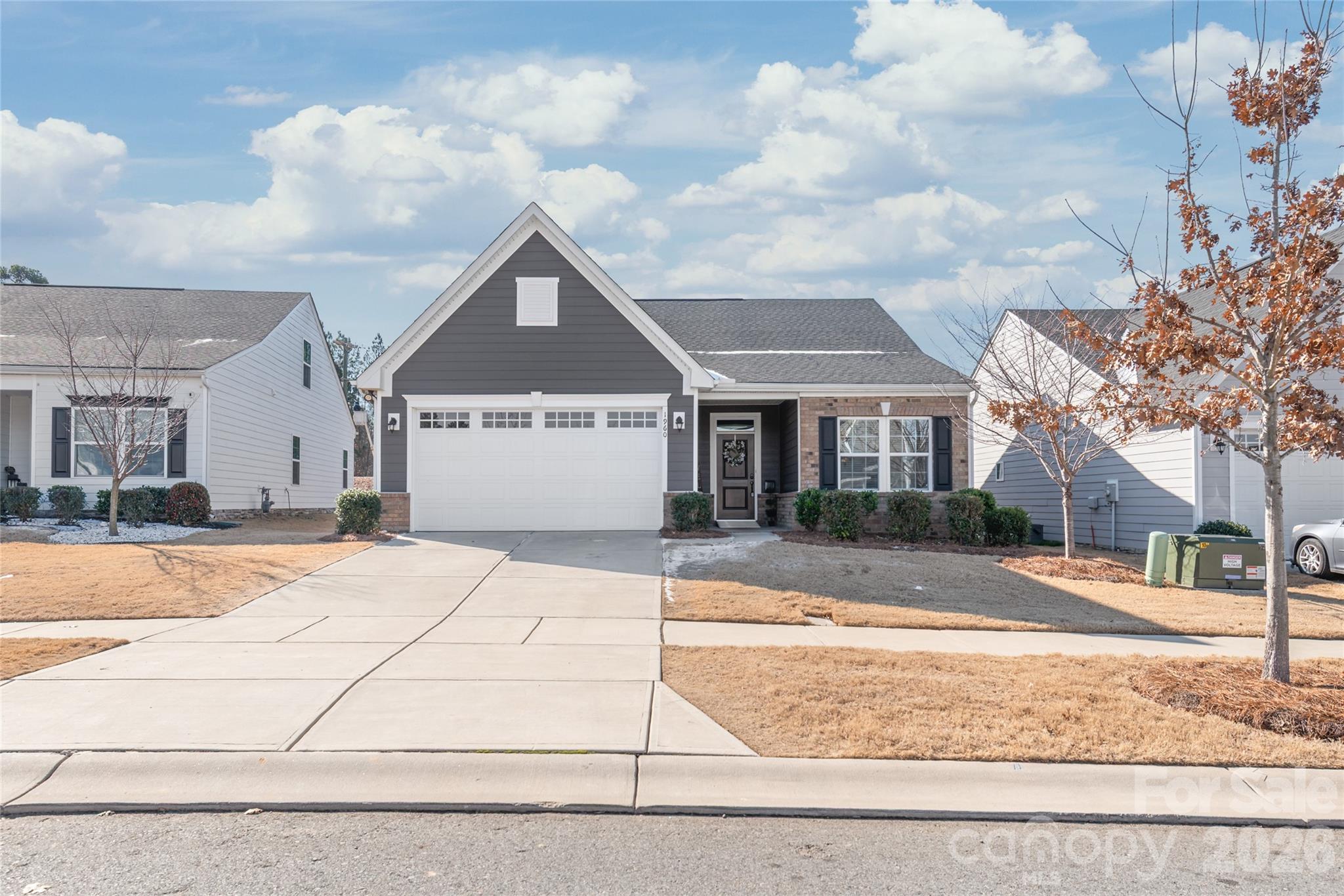 1960 Slippery Rock Lane Monroe, NC 28112 - Photo 30 of 32 a front view of a house with a yard