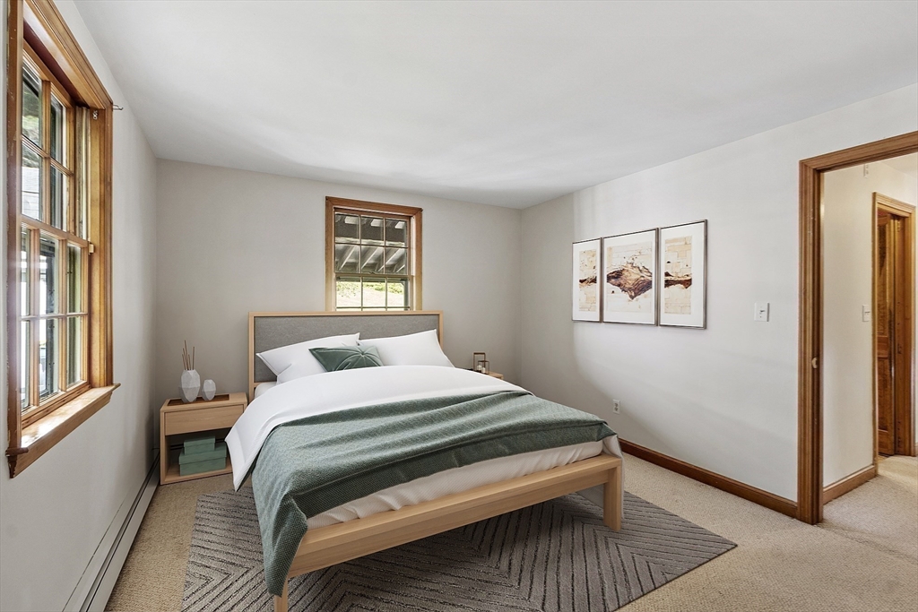 54 Kemp Street Groton, MA 01450 - Photo 14 of 38 a bedroom with a bed and a window