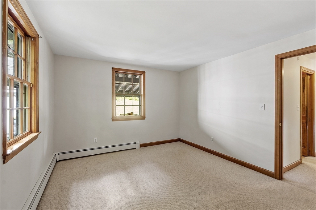 54 Kemp Street Groton, MA 01450 - Photo 15 of 38 an empty room with windows