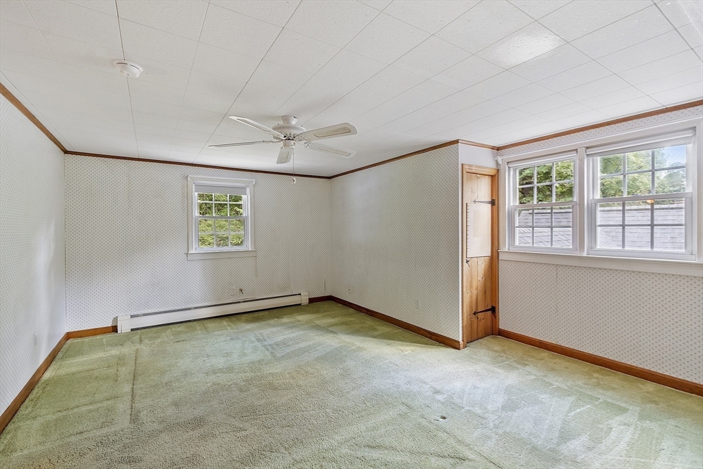 54 Kemp Street Groton, MA 01450 - Photo 18 of 38 a view of an empty room with a window