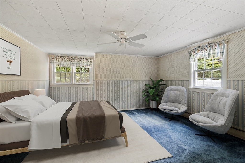 54 Kemp Street Groton, MA 01450 - Photo 19 of 38 a bedroom with a bed and a couch