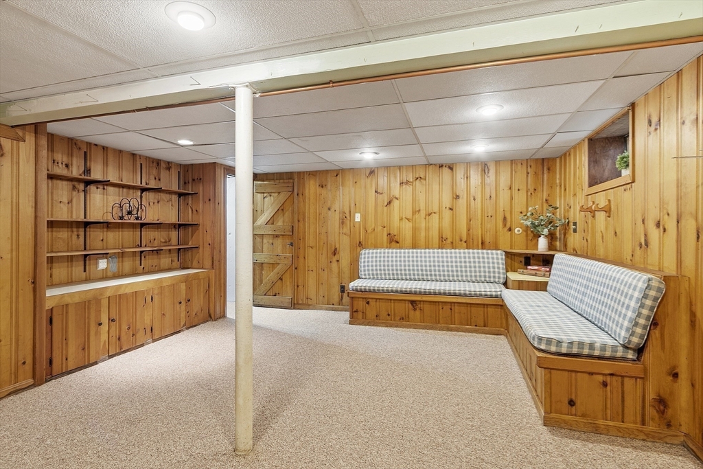 54 Kemp Street Groton, MA 01450 - Photo 22 of 38 a spacious bedroom with a bed and walk in closet