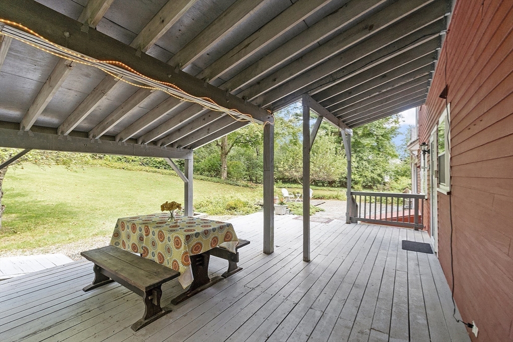 54 Kemp Street Groton, MA 01450 - Photo 29 of 38 a view of a two chairs in the balcony