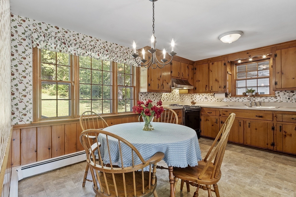 54 Kemp Street Groton, MA 01450 - Photo 9 of 38 a view of a dining room with furniture window and outside view