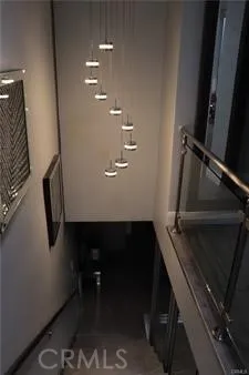 a bedroom with a bed and chair