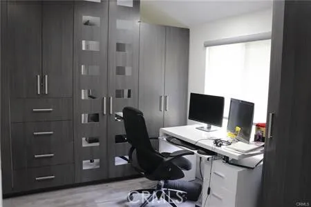 a view of gallery with windows