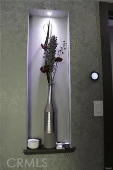 a vase of flowers sitting on a table