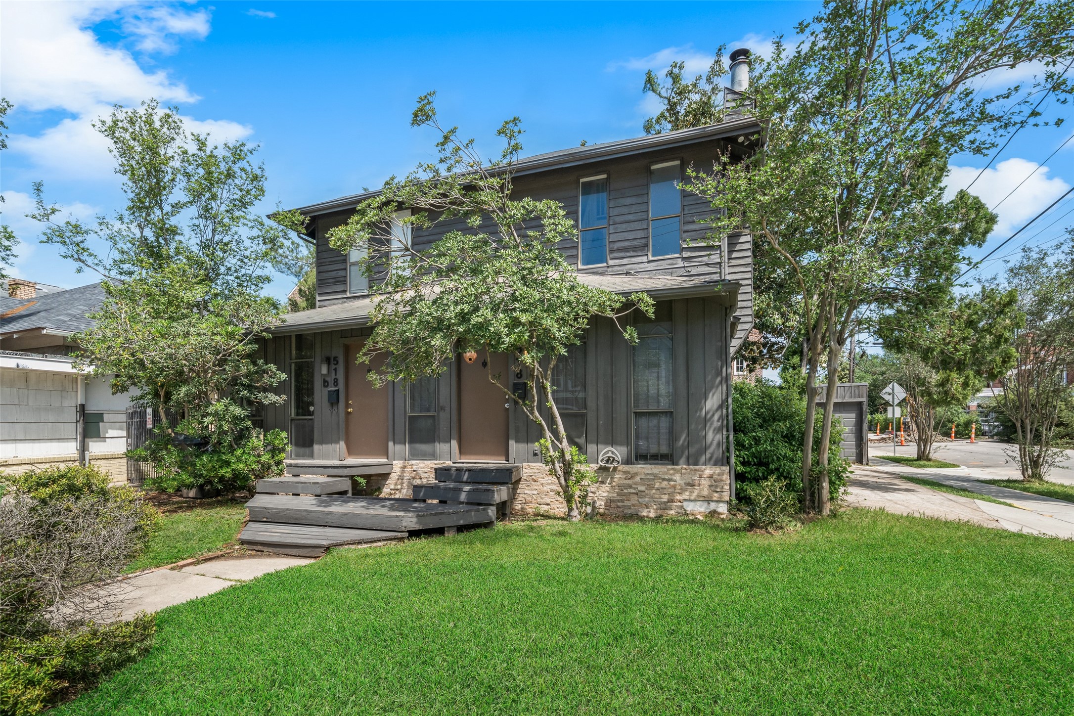 518 Hawthorne Street, Unit 2 Houston, TX 77006 - Photo 2 of 15 a view of a house with backyard and sitting area