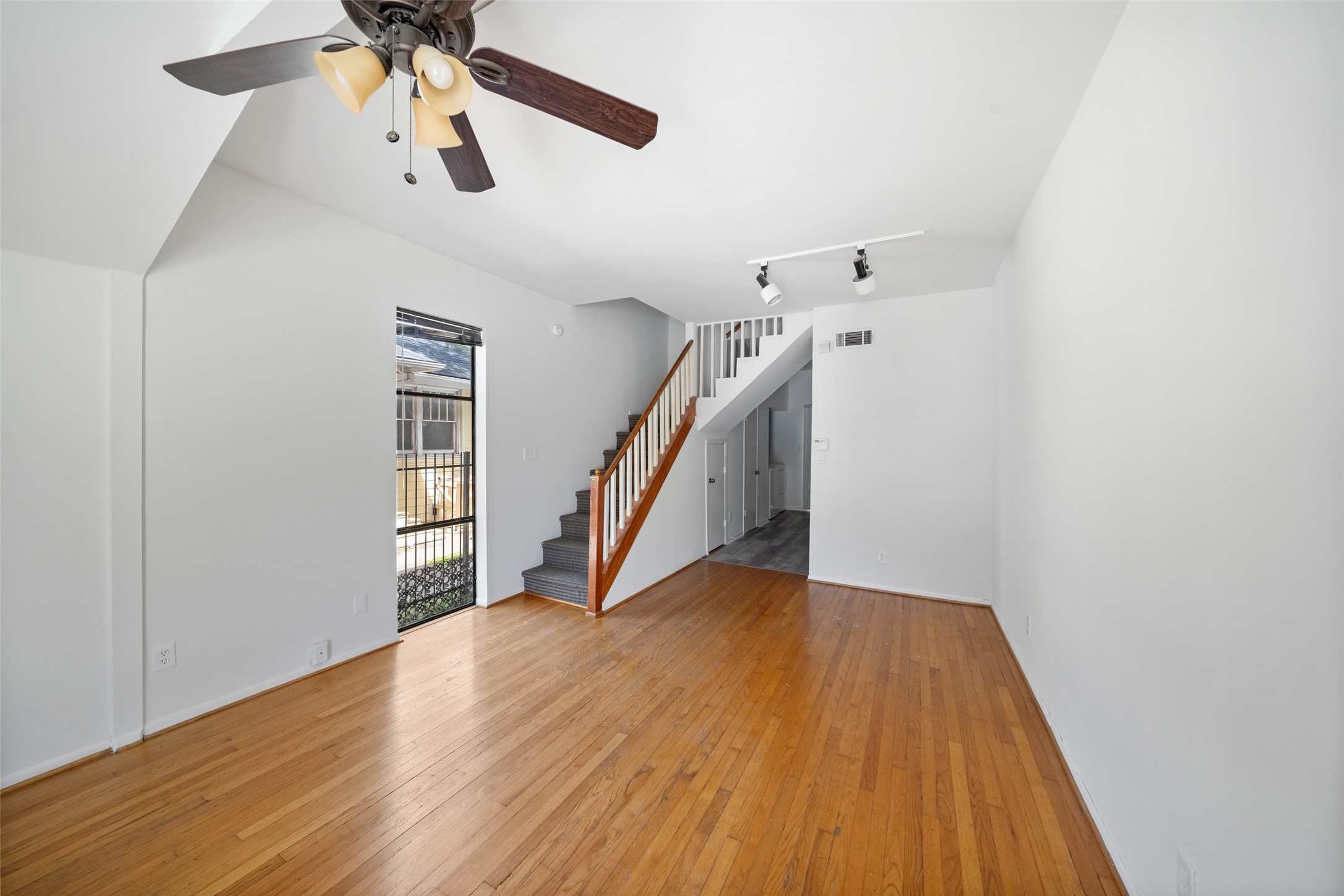 518 Hawthorne Street, Unit 2 Houston, TX 77006 - Photo 5 of 15 a view of an entryway with wooden floor