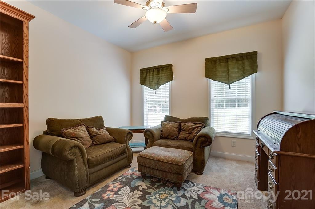 9180 Meadowood Road Mount Pleasant, NC 28124 - Photo 31 of 37 a living room with furniture and a window