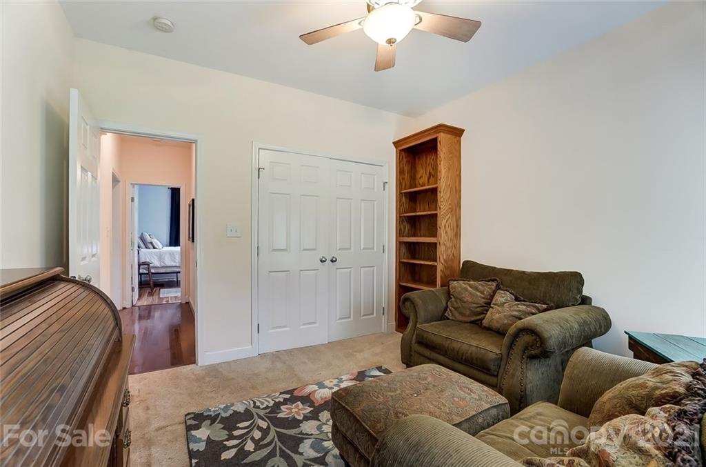 9180 Meadowood Road Mount Pleasant, NC 28124 - Photo 32 of 37 a bedroom with a bed and closet