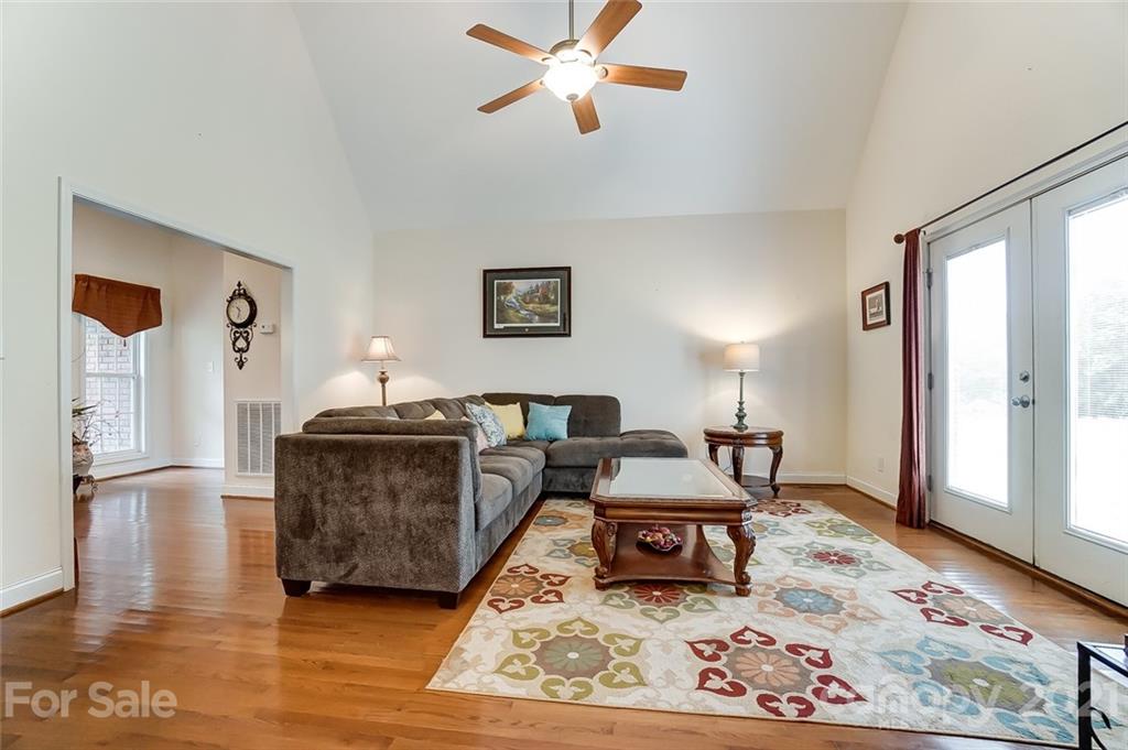 9180 Meadowood Road Mount Pleasant, NC 28124 - Photo 7 of 37 a living room with furniture and a window