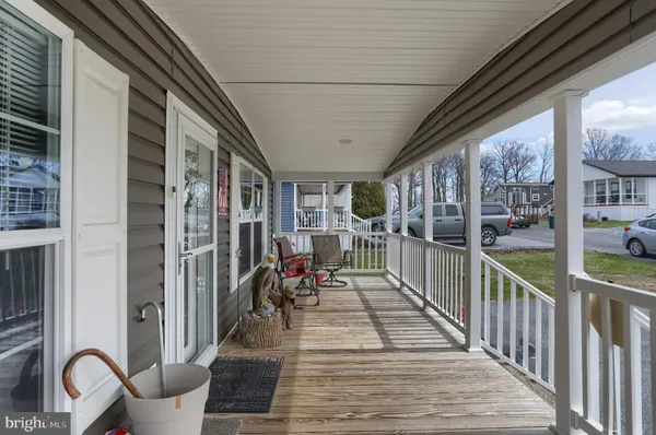 a view of a porch with furniture