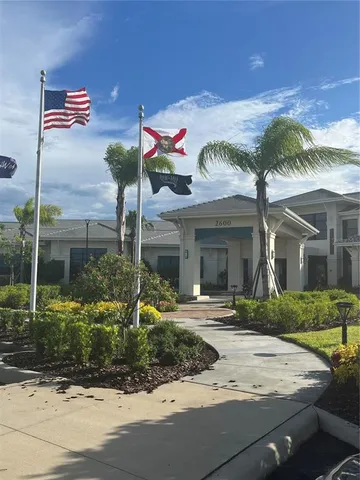 a gym room with lots of gym equipment