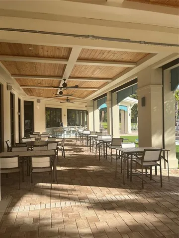 a front view of a house with a yard table and chairs