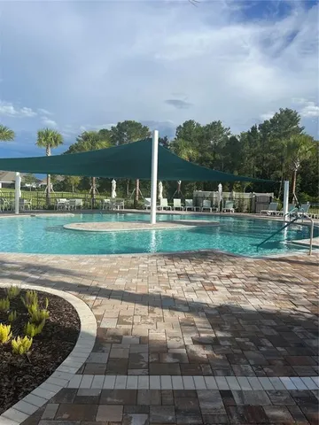 a view of a lake with a sitting space