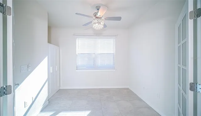 a bathroom with a sink toilet vanity and shower
