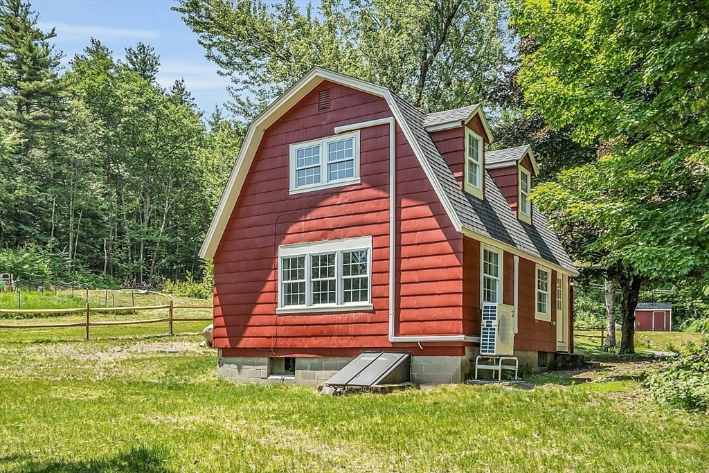 203 Taylor Road Ashby, MA 01431 - Photo 3 of 30 a backyard of a house with lots of green space