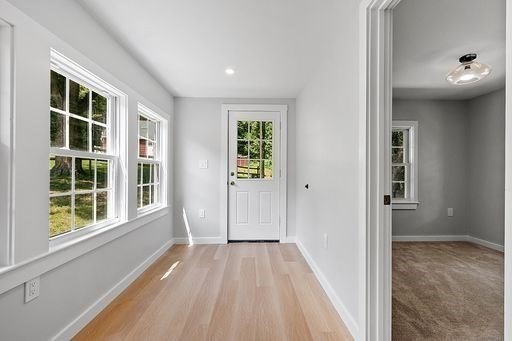 203 Taylor Road Ashby, MA 01431 - Photo 8 of 30 wooden floor in an empty room with a window