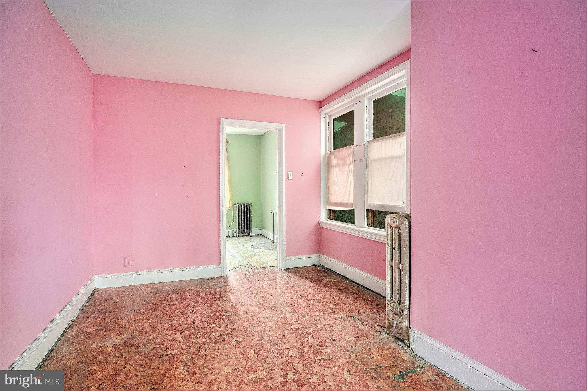 527 Christian Street Philadelphia, PA 19147 - Photo 18 of 28 a view of an empty room with window