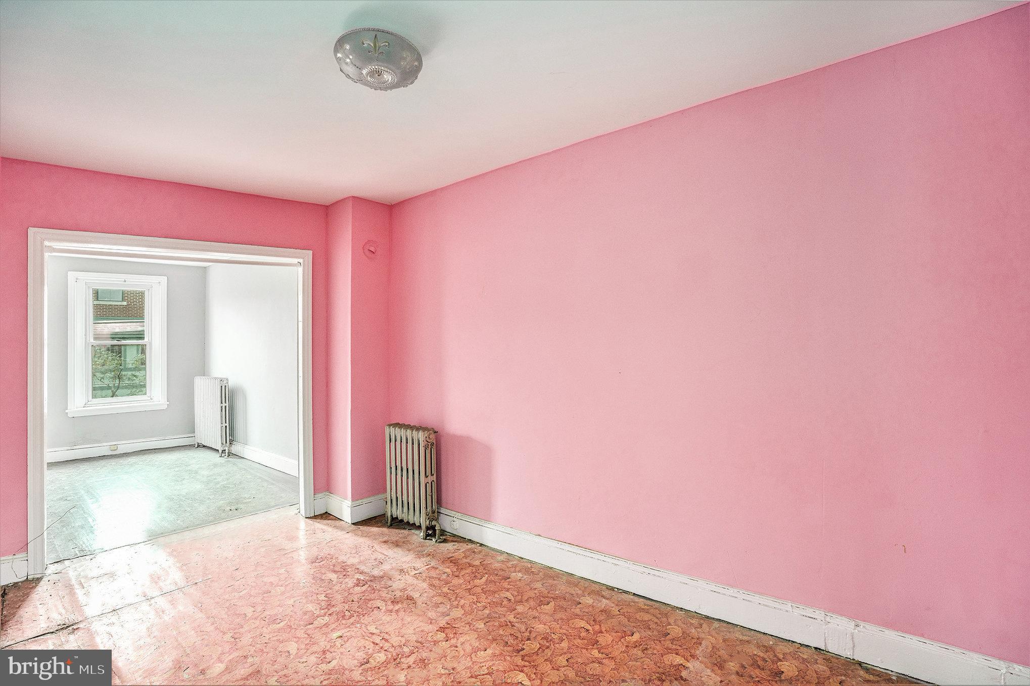 527 Christian Street Philadelphia, PA 19147 - Photo 21 of 28 a view of an empty room with a window