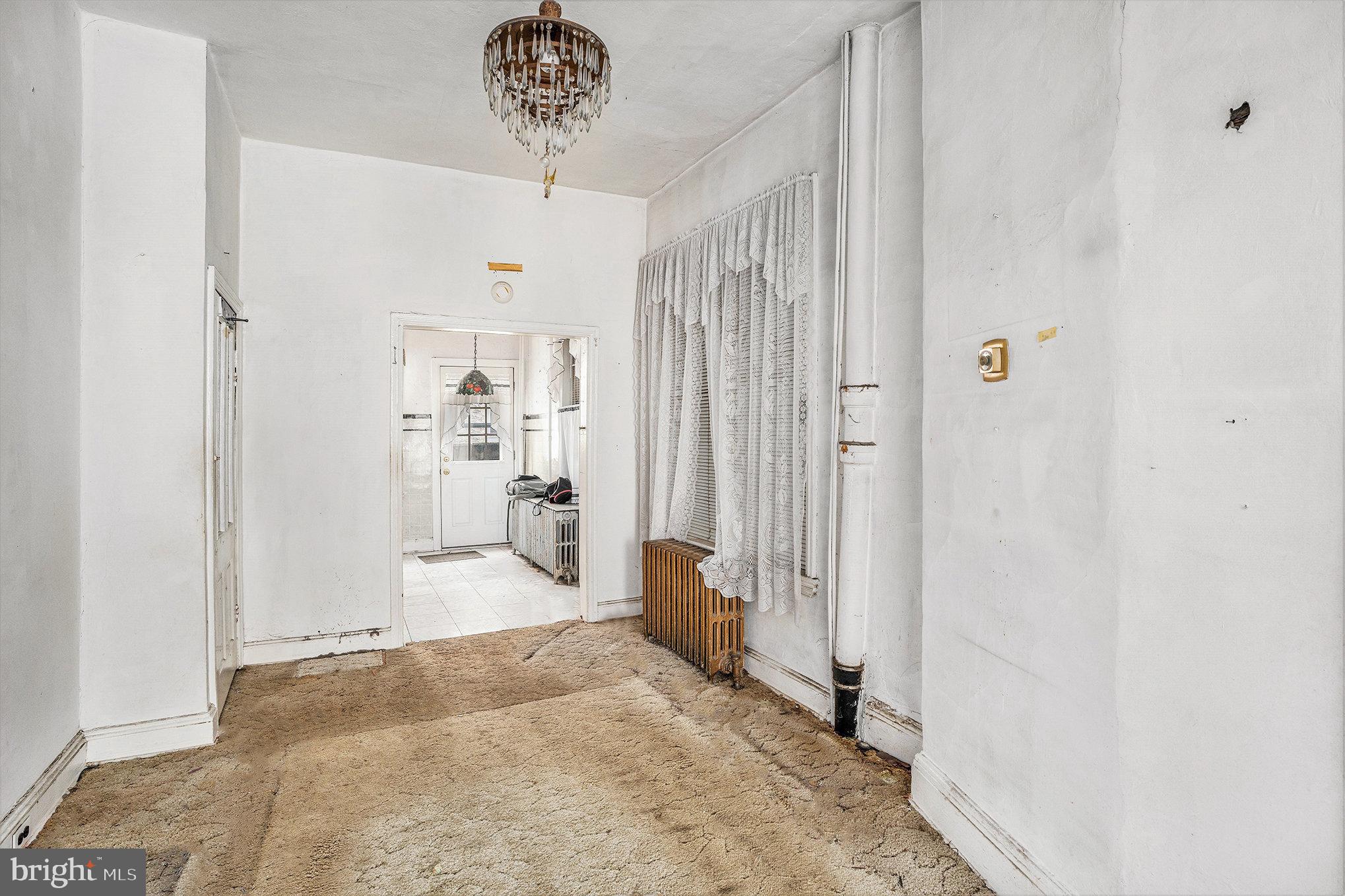 527 Christian Street Philadelphia, PA 19147 - Photo 10 of 28 a view of a hallway with closet and a window