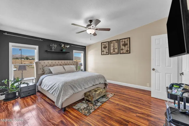 an aerial view of a house with a ocean view