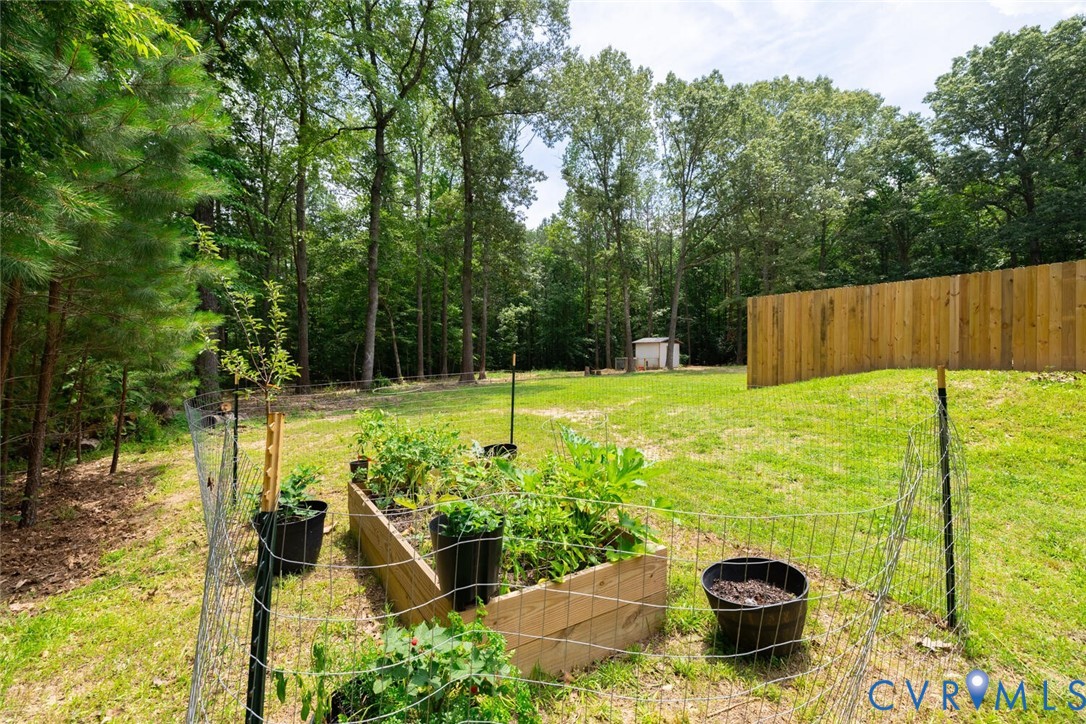 12397 New Market Mill Road Beaverdam, VA 23015 - Photo 42 of 44 a view of a swimming pool with a patio