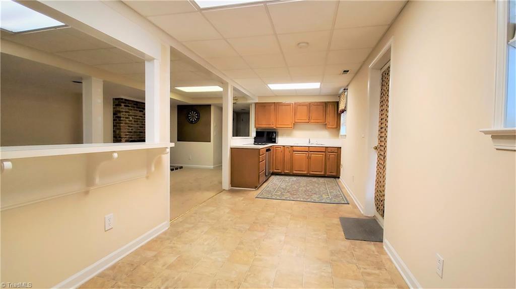 3358 Nottingham Road Winston-Salem, NC 27104 - Photo 17 of 29 Lower Level Dining and Kitchen