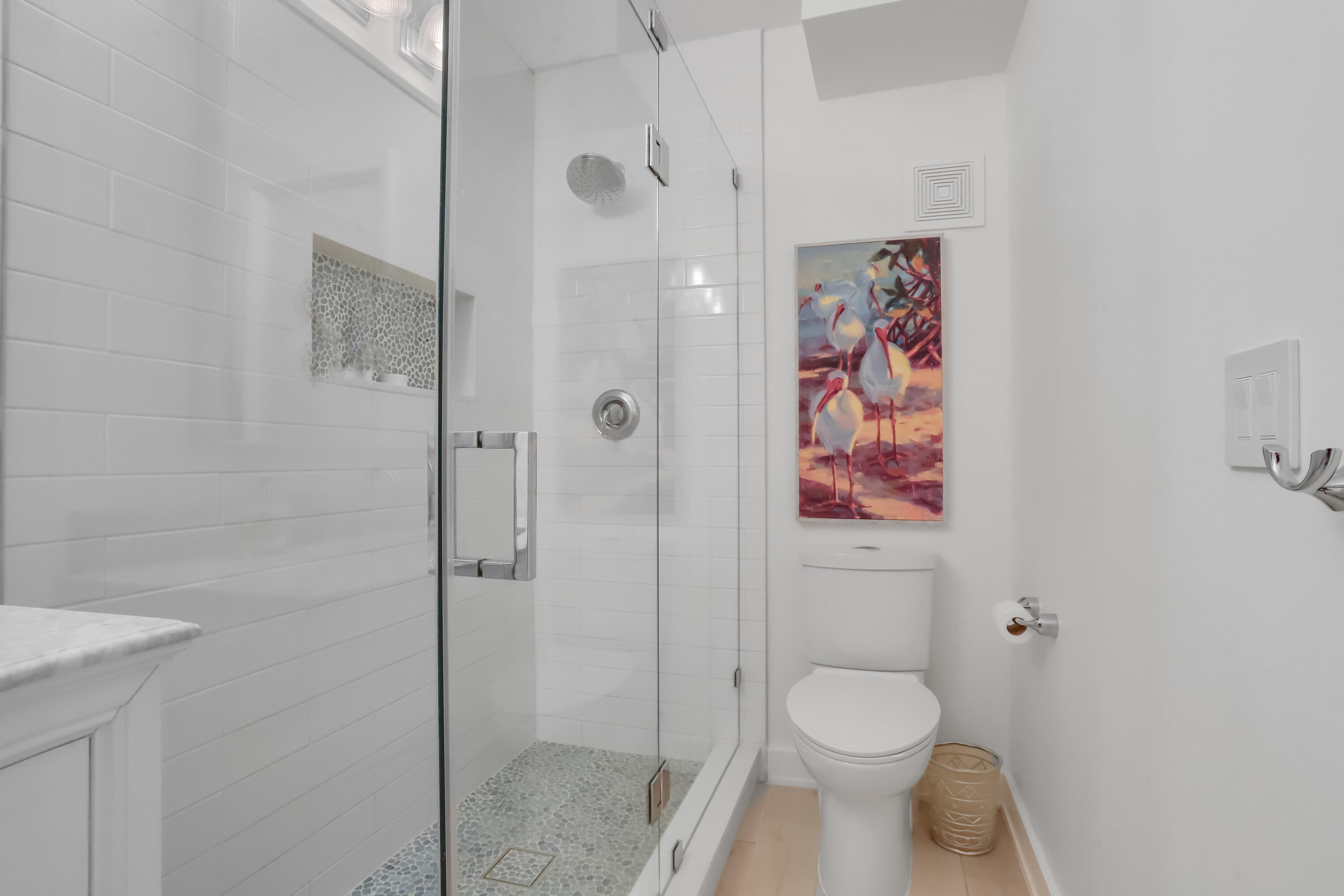 217 Gleason Street, Unit A Delray Beach, FL 33483 - Photo 13 of 28 a bathroom with a toilet and a shower