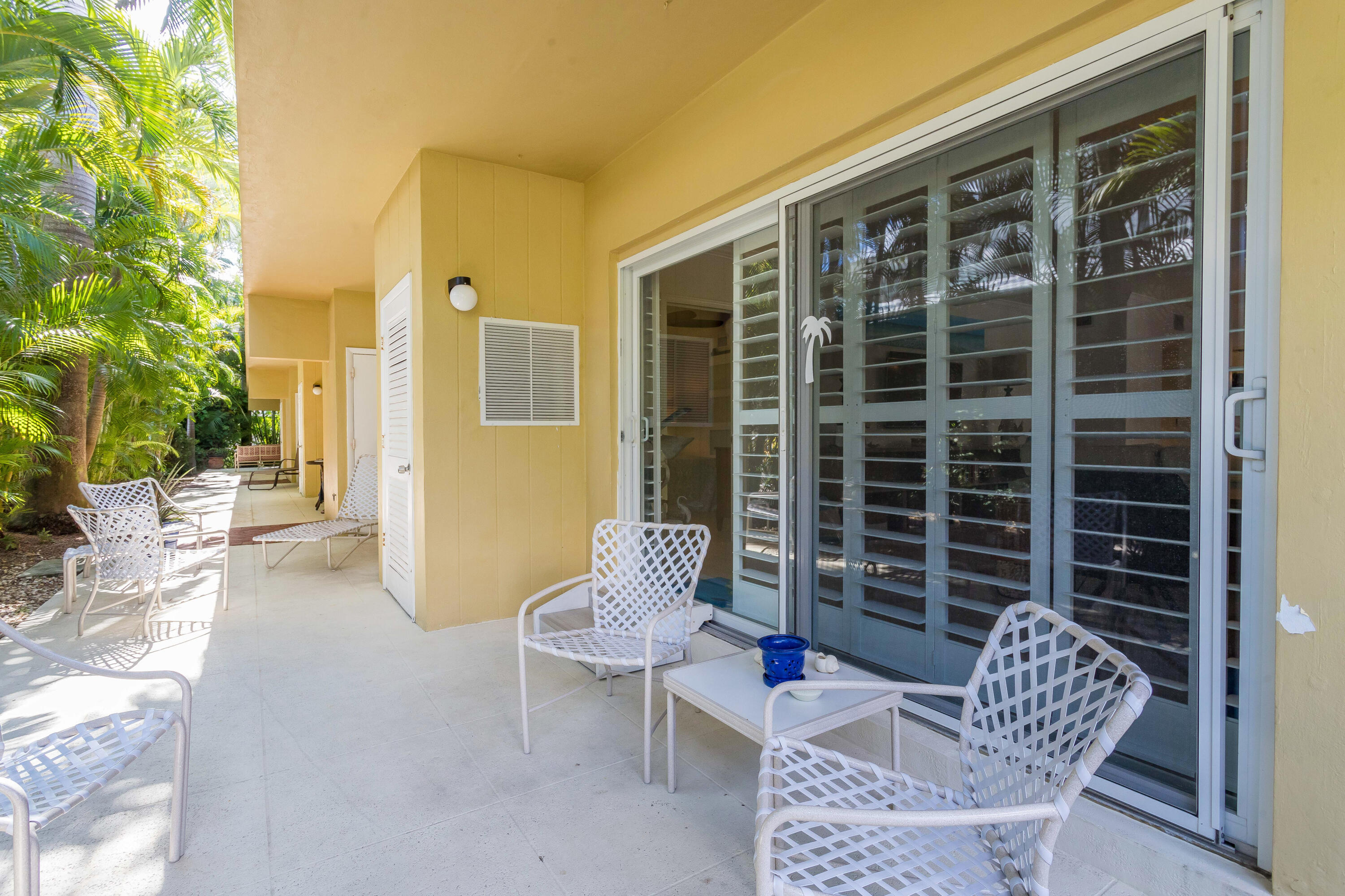 217 Gleason Street, Unit A Delray Beach, FL 33483 - Photo 20 of 28 a balcony view with a couch