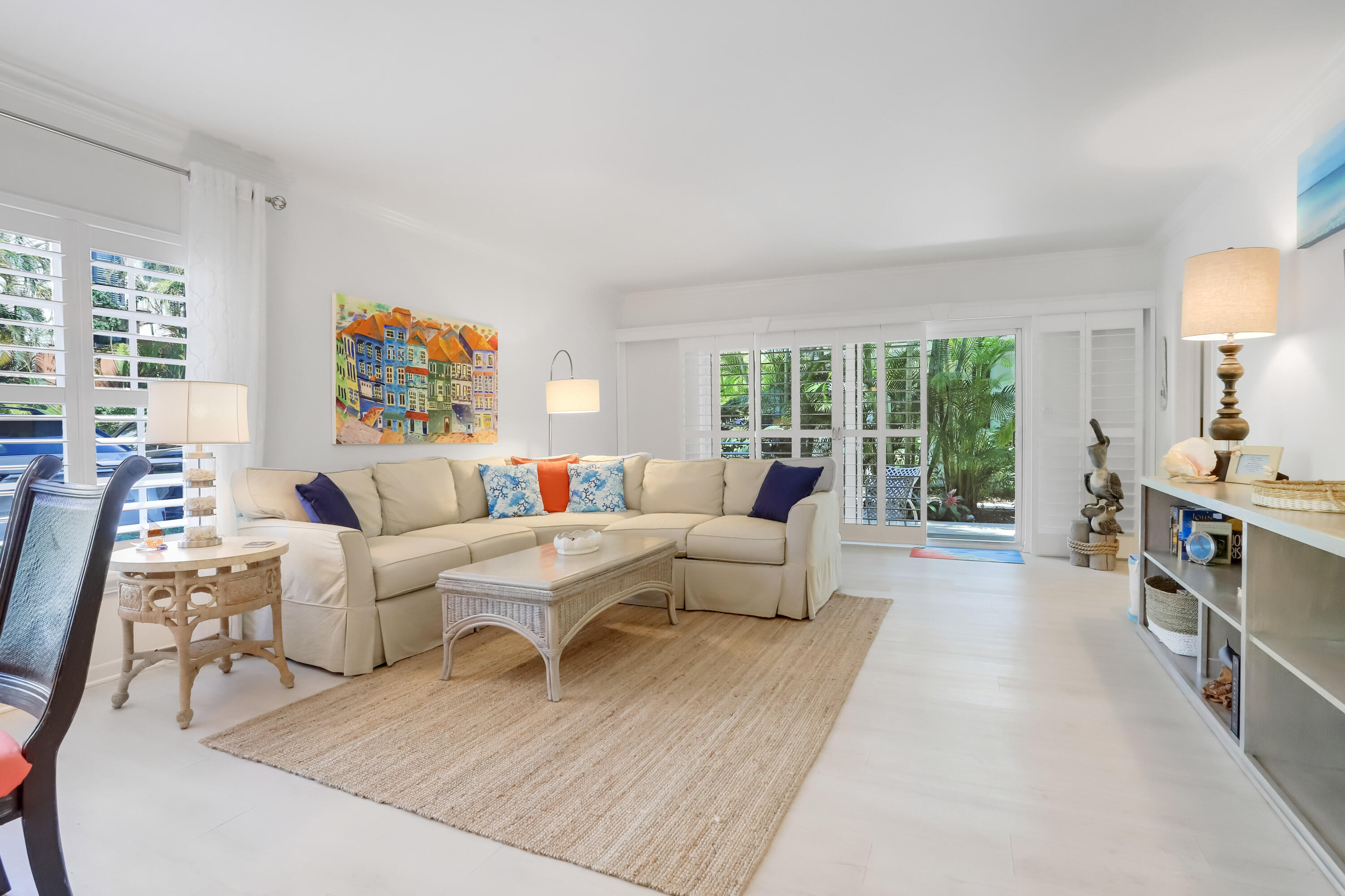 217 Gleason Street, Unit A Delray Beach, FL 33483 - Photo 3 of 28 a living room with fireplace furniture and a large window