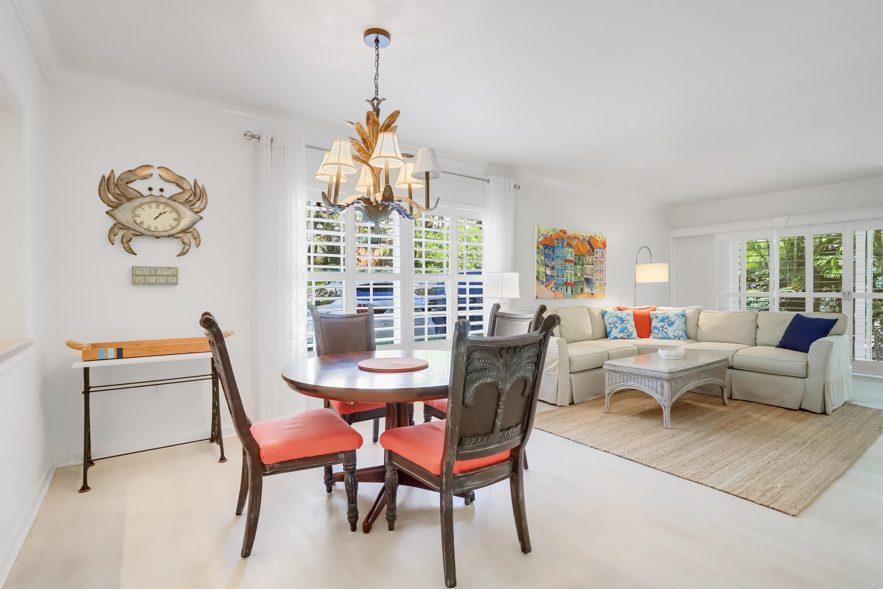 217 Gleason Street, Unit A Delray Beach, FL 33483 - Photo 4 of 28 a living room with furniture a rug and a large window