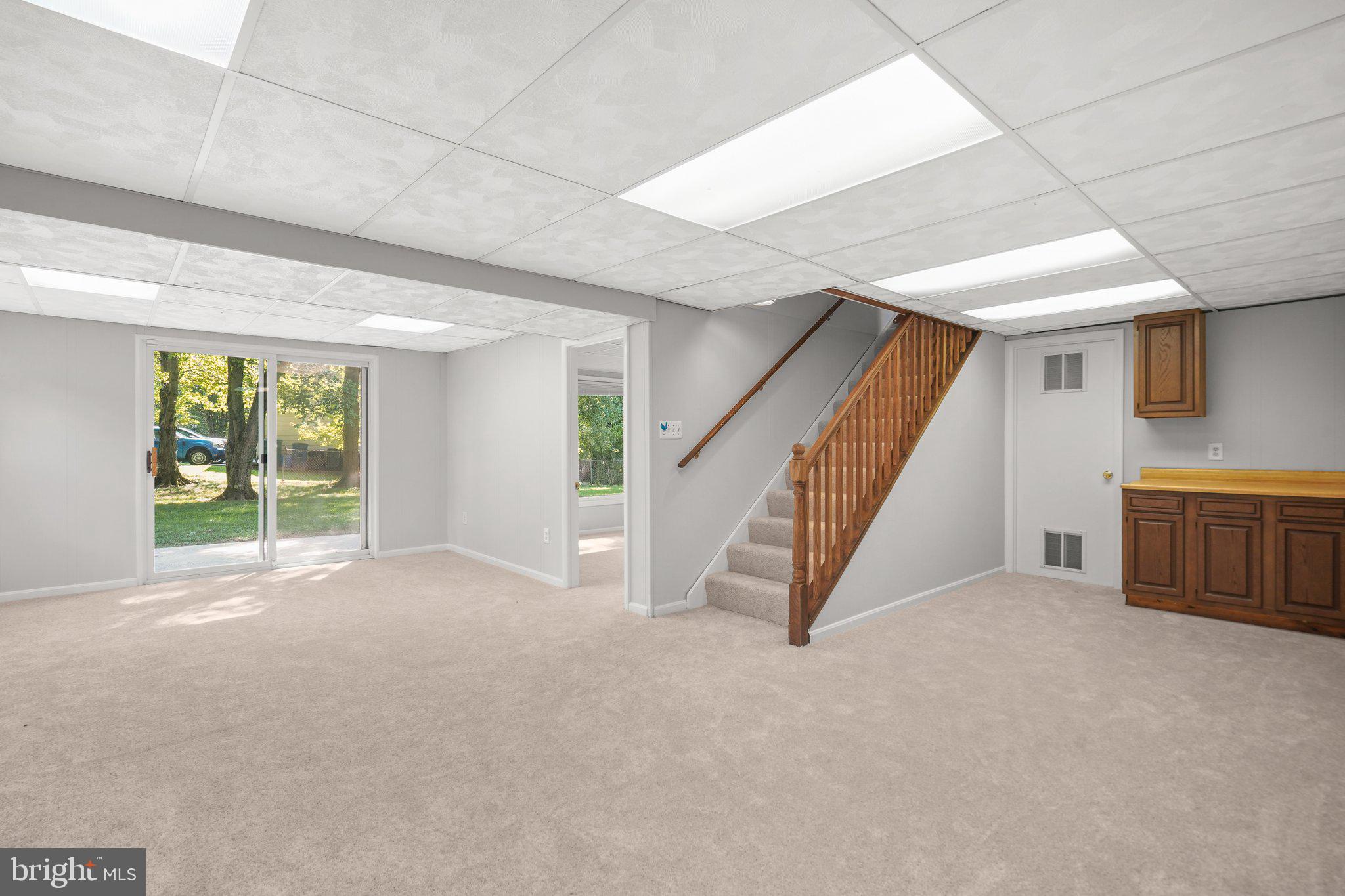 13800 Turnmore Road Silver Spring, MD 20906 - Photo 32 of 39 Walk-Out Lower Level Recreation Room