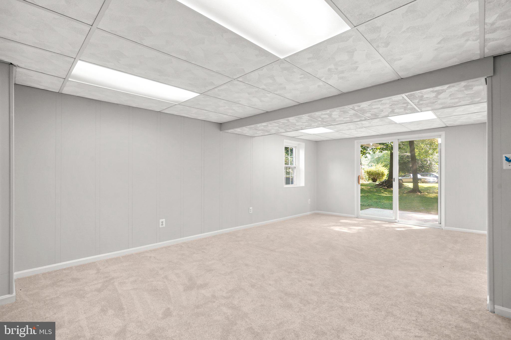 13800 Turnmore Road Silver Spring, MD 20906 - Photo 33 of 39 Walk-Out Lower Level Recreation Room