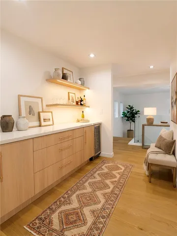 a spacious bedroom with a bed and furniture