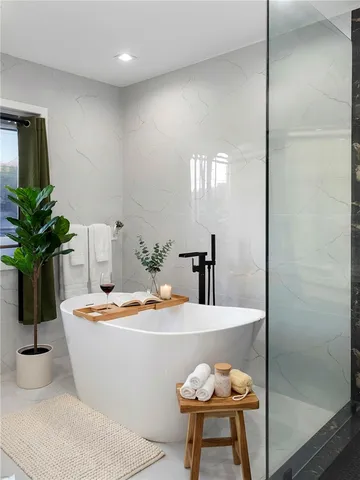 a dining room with table and chairs