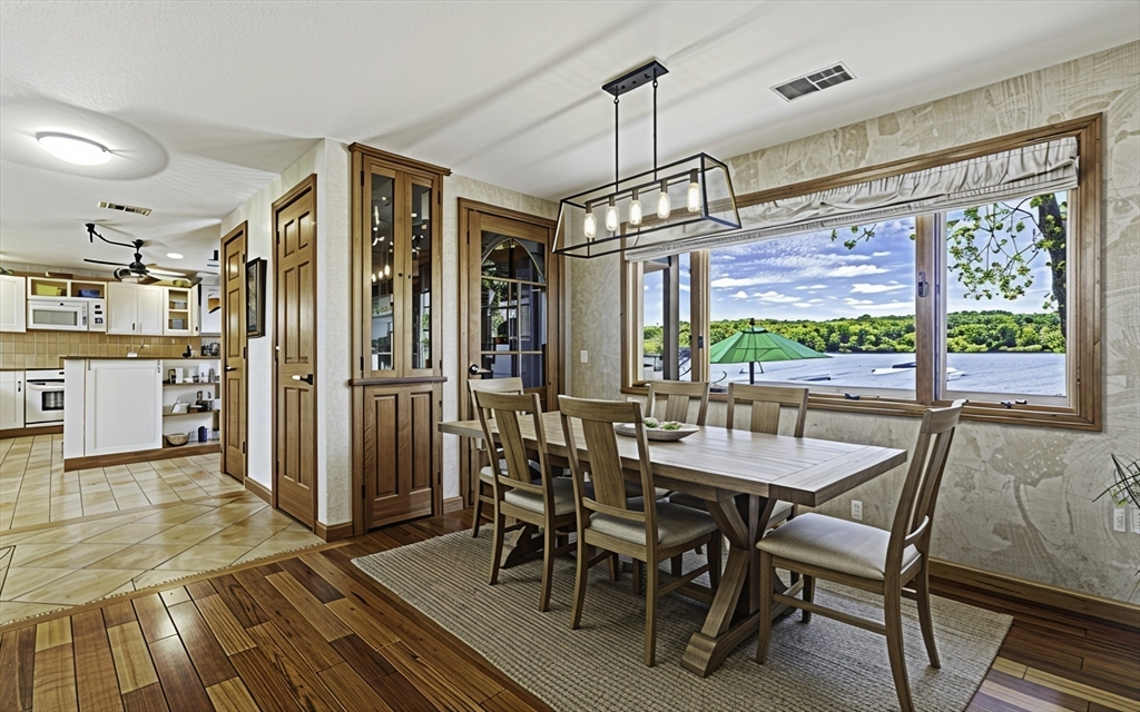 28 Downey Street Hopkinton, MA 01748 - Photo 11 of 39 a view of a dining room with furniture window and wooden floor