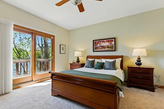 a bedroom with furniture and window