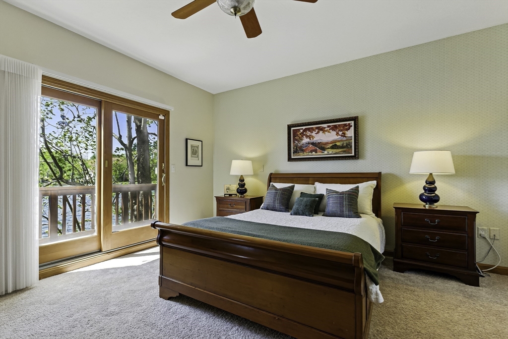 28 Downey Street Hopkinton, MA 01748 - Photo 16 of 39 a bedroom with a bed and a large window