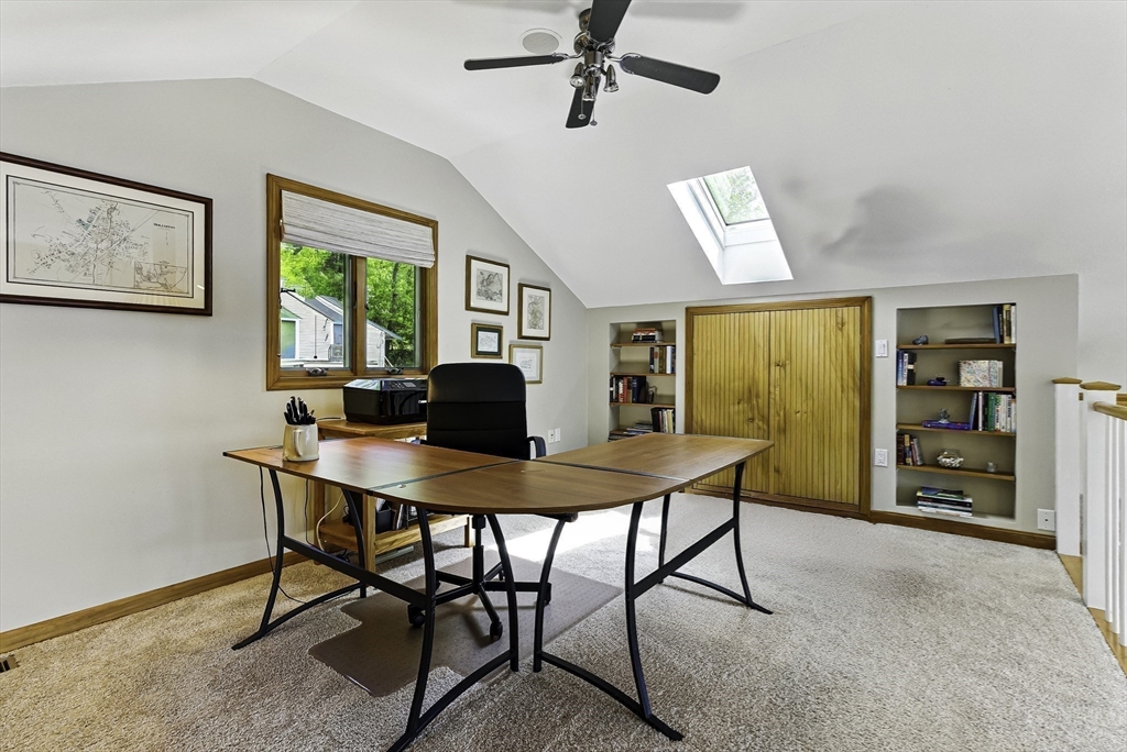 28 Downey Street Hopkinton, MA 01748 - Photo 23 of 39 a view of a workspace with furniture and a window