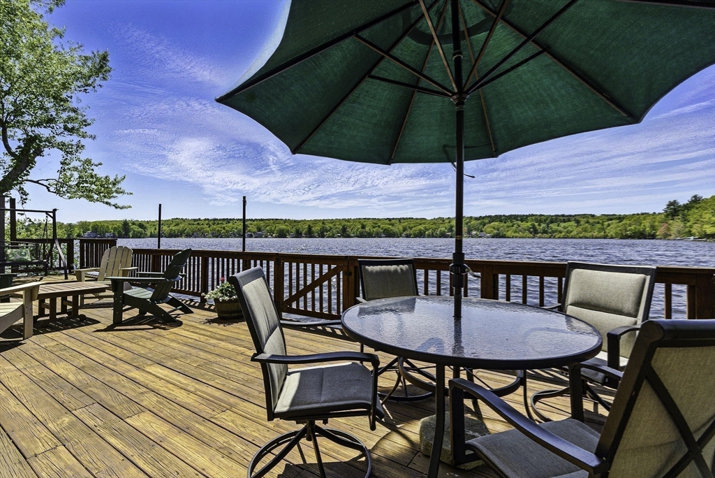 28 Downey Street Hopkinton, MA 01748 - Photo 27 of 39 a view of a chairs and table on the deck